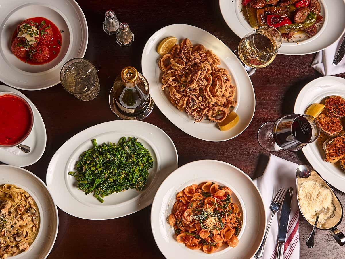 Table filled with the best Italian food in Chicago